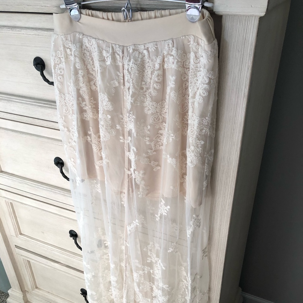 Gorgeous Entro lace skirt with attached shorts. Very flowy.